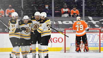 Apr 6, 2021; Philadelphia, Pennsylvania, USA; Boston Bruins center Brad Marchand (63) celebrates his shorthanded goal with teammates against the Philadelphia Flyers during the third period at Wells Fargo Center. Mandatory Credit: Eric Hartline-USA TODAY Sports