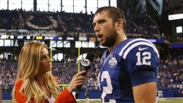 Oct 6, 2013; Indianapolis, IN, USA; Indianapolis Colts quarterback Andrew Luck (12) is interviewed by FOX reporter Erin Andrews after the game against the Seattle Seahawks at Lucas Oil Stadium. The Colts won 34-28. Mandatory Credit: Pat Lovell-USA TODAY Sports