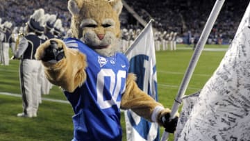 PROVO, UT - OCTOBER 03: 'Cosmo' the Brigham Young Cougars mascot welcomes the team on field before their game against the Utah State Aggies at LaVell Edwards Stadium on October 3, 2014 in Provo, Utah. (Photo by Gene Sweeney Jr/Getty Images )