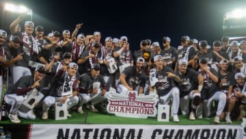 Jun 30, 2021; Omaha, Nebraska, USA; The Mississippi St. Bulldogs pose for a team photo after winning the national championship against the Vanderbilt Commodores at TD Ameritrade Park. Mandatory Credit: Steven Branscombe-USA TODAY Sports