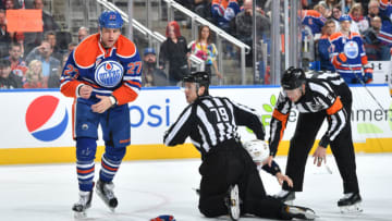 EDMONTON, AB - JANUARY 20: Milan Lucic #27 of the Edmonton Oilers fights with Cody McLeod #55 of the Nashville Predators on January 20, 2017 at Rogers Place in Edmonton, Alberta, Canada. (Photo by Andy Devlin/NHLI via Getty Images)