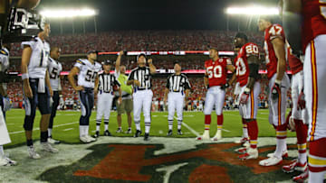 KANSAS CITY, MO - SEPTEMBER 13: Team captains for the Kansas City Chiefs meet with team captains for the San Diego Chargers for the coin toss before a game on September 13, 2010 at Arrowhead Stadium in Kansas City, Missouri. The Chiefs won 21-14.(Photo by Tim Umphrey/Getty Images)