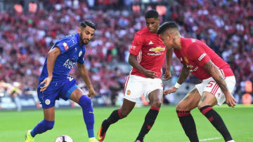 LONDON, ENGLAND - AUGUST 07: Riyad Mahrez of Leicester City runs at Marcos Rojo of Manchester United during The FA Community Shield match between Leicester City and Manchester United at Wembley Stadium on August 7, 2016 in London, England. (Photo by Alex Broadway/Getty Images)