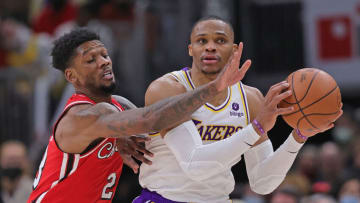 Russell Westbrook #0 of the Los Angeles Lakers looks to pass under pressure from Alfonzo McKinnie #28 of the Chicago Bulls at the United Center on 19 Dec. 2021 in Chicago, Illinois. The Bulls defeated the Lakers 115-110. (Photo by Jonathan Daniel/Getty Images)