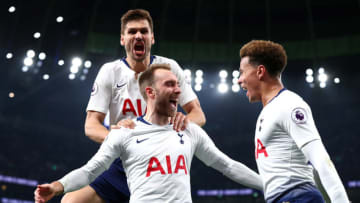 LONDON, ENGLAND - APRIL 23: Christian Eriksen of Tottenham Hotspur celebrates with teammates after scoring his team's first goal during the Premier League match between Tottenham Hotspur and Brighton & Hove Albion at Tottenham Hotspur Stadium on April 23, 2019 in London, United Kingdom. (Photo by Clive Rose/Getty Images)