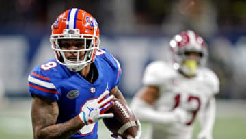 Dec 19, 2020; Atlanta, Georgia, USA; Florida Gators wide receiver Trevon Grimes (8) runs for a touchdown during the third quarter against the Alabama Crimson Tide in the SEC Championship at Mercedes-Benz Stadium. Mandatory Credit: Dale Zanine-USA TODAY Sports