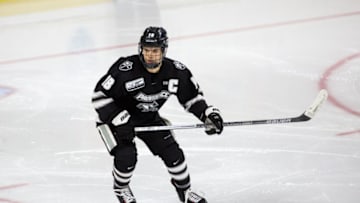 Sabres' prospect Jacob Bryson #18 of the Providence College Friars skates against the Boston College Eagles. (Photo by Richard T Gagnon/Getty Images)