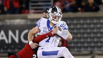 Kentuckys Will Levi runs for a first down against Louisville. Syndication: The Courier-Journal