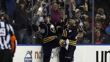Mar 16, 2016; Buffalo, NY, USA; Buffalo Sabres left wing Marcus Foligno (82) celebrates his goal against the Montreal Canadiens during the third period at First Niagara Center. The Canadiens beat the Sabres 3-2 in overtime. Mandatory Credit: Kevin Hoffman-USA TODAY Sports