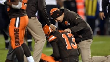 Nov 30, 2015; Cleveland, OH, USA; Cleveland Browns quarterback Josh McCown (13) is attended to by the Cleveland Browns training staff after being injured during the fourth quarter against the Baltimore Ravens at FirstEnergy Stadium. Mandatory Credit: Ken Blaze-USA TODAY Sports