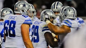 Dec 4, 2014; Chicago, IL, USA; Dallas Cowboys running back DeMarco Murray (29) celebrates with teammates after he scores a touchdown in the first half of their game against the Chicago Bears at Soldier Field. Mandatory Credit: Matt Marton-USA TODAY Sports