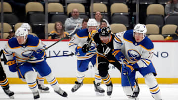 Sep 28, 2023; Pittsburgh, Pennsylvania, USA; Buffalo Sabres right wing JJ Peterka (77) leads a break-out up ice against the Pittsburgh Penguins during the third period at PPG Paints Arena. Pittsburgh won 3-1. Mandatory Credit: Charles LeClaire-USA TODAY Sports