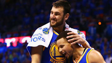 OKLAHOMA CITY, OK - MAY 28: Andrew Bogut #12 of the Golden State Warriors celebrates with Stephen Curry #30 during the fourth quarter against the Oklahoma City Thunder in game six of the Western Conference Finals during the 2016 NBA Playoffs at Chesapeake Energy Arena on May 28, 2016 in Oklahoma City, Oklahoma. NOTE TO USER: User expressly acknowledges and agrees that, by downloading and or using this photograph, User is consenting to the terms and conditions of the Getty Images License Agreement. (Photo by Maddie Meyer/Getty Images)