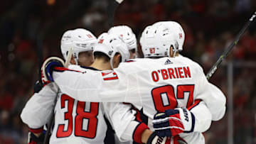 CHICAGO, ILLINOIS - SEPTEMBER 25: Liam O'Brien #87 of the Washington Capitals celebrates a first period goal with teammates including (L-R) Chandler Stephenson, Colby Williams #38 and Richard Panik #14 during a preseason game against the Chicago Blackhawksat United Center on September 25, 2019 in Chicago, Illinois. (Photo by Jonathan Daniel/Getty Images)