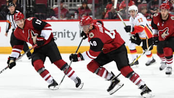 GLENDALE, AZ - MARCH 07: Michael Grabner #40 of the Arizona Coyotes advances the puck up ice against the Calgary Flames during the third period at Gila River Arena on March 7, 2019 in Glendale, Arizona. (Photo by Norm Hall/NHLI via Getty Images)