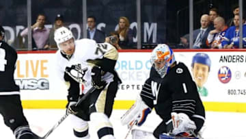 Mar 8, 2016; Brooklyn, NY, USA; New York Islanders goaltender Thomas Greiss (1) defends his net against the Pittsburgh Penguins during the third period at Barclays Center. The Islanders defeated the Penguins 2-1. Mandatory Credit: Andy Marlin-USA TODAY Sports