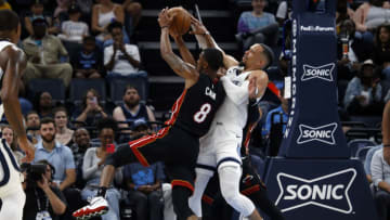 Miami Heat forward Jamal Cain (8), Miami Heat guard Gabe Vincent (2) and Memphis Grizzlies forward Dillon Brooks (24) battle for a loose ball(Petre Thomas-USA TODAY Sports)