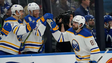 Mar 13, 2023; Toronto, Ontario, CAN; Buffalo Sabres forward Alex Tuch (89) gets congratulated after scoring the game winning goal against the Toronto Maple Leafs during the third period at Scotiabank Arena. Mandatory Credit: John E. Sokolowski-USA TODAY Sports