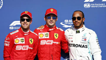 SPA, BELGIUM - AUGUST 31: Top three qualifiers Charles Leclerc of Monaco and Ferrari, Lewis Hamilton of Great Britain and Mercedes GP and Sebastian Vettel of Germany and Ferrari celebrate in parc ferme during qualifying for the F1 Grand Prix of Belgium at Circuit de Spa-Francorchamps on August 31, 2019 in Spa, Belgium. (Photo by Will Taylor-Medhurst/Getty Images)