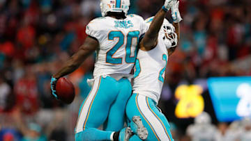 ATLANTA, GA - OCTOBER 15: Reshad Jones #20 of the Miami Dolphins reacts after intercepting a pass intended for Austin Hooper #81 of the Atlanta Falcons in the final seconds with Xavien Howard #25 at Mercedes-Benz Stadium on October 15, 2017 in Atlanta, Georgia. (Photo by Kevin C. Cox/Getty Images)