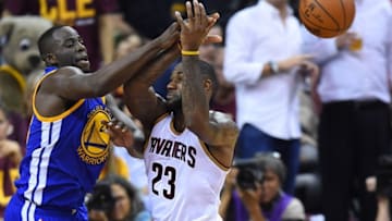 Jun 10, 2016; Cleveland, OH, USA; Golden State Warriors forward Draymond Green (23) knocks the ball from Cleveland Cavaliers forward LeBron James (23) in the second half in game four of the NBA Finals at Quicken Loans Arena. Mandatory Credit: Bob Donnan-USA TODAY Sports