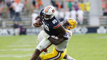 Auburn footballOct 31, 2020; Auburn, Alabama, USA; Auburn Tigers tight end JJ Peques (89) is tackled by LSU Tigers lineman AliGaye (11) during the third quarter at Jordan-Hare Stadium. Mandatory Credit: John Reed-USA TODAY Sports