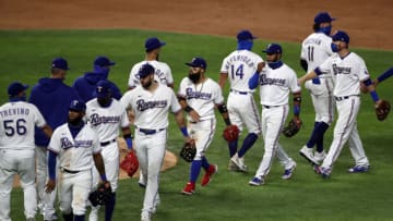 ARLINGTON, TEXAS - JULY 24: Rougned Odor #12 of the Texas Rangers celebrates a 1-0 win against the Colorado Rockies on Opening Day at Globe Life Field on July 24, 2020 in Arlington, Texas. The 2020 season had been postponed since March due to the COVID-19 pandemic. (Photo by Ronald Martinez/Getty Images)