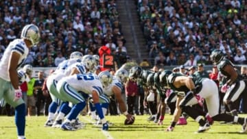 Oct 20, 2013; Philadelphia, PA, USA; The Dallas Cowboys and Philadelphia Eagles at the line of scrimmage during the second quarter at Lincoln Financial Field. The Cowboys defeated the Eagles 17-3. Mandatory Credit: Howard Smith-USA TODAY Sports