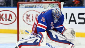 Sep 29, 2014; New York, NY, USA; New York Rangers goalie Henrik Lundqvist (30) drops as he misses the save on a shot by Philadelphia Flyers center Jason Akeson (not pictured) during the second period at Madison Square Garden. Mandatory Credit: Anthony Gruppuso-USA TODAY Sports