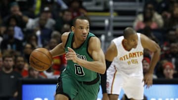 Apr 9, 2016; Atlanta, GA, USA; Boston Celtics guard Avery Bradley (0) pushes the ball up the court in the fourth quarter of their game against the Atlanta Hawks at Philips Arena. The Hawks won 118-107. Mandatory Credit: Jason Getz-USA TODAY Sports