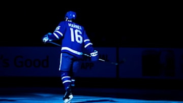 TORONTO, ON - JANUARY 12: Mitch Marner #16 of the Toronto Maple Leafs skates during introductions before playing the Boston Bruins at the Scotiabank Arena on January 12, 2019 in Toronto, Ontario, Canada. (Photo by Mark Blinch/NHLI via Getty Images)