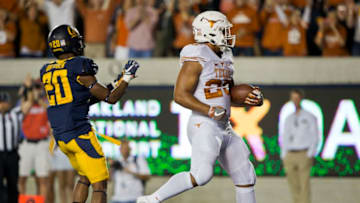 BERKELEY, CA - SEPTEMBER 17: Running back Chris Warren III #25 of the Texas Longhorns scores a touchdown against cornerback Josh Drayden #20 of the California Golden Bears in the first quarter on September 17, 2016 at California Memorial Stadium in Berkeley, California. Cal won 50-43. (Photo by Brian Bahr/Getty Images)