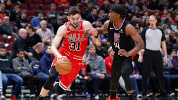 Dec 14, 2019; Chicago, IL, USA; Chicago Bulls guard Tomas Satoransky (31) drives to the basket against LA Clippers guard Terance Mann (14) during the first half at United Center. Mandatory Credit: Kamil Krzaczynski-USA TODAY Sports