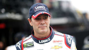 HOMESTEAD, FL - NOVEMBER 16: Jimmie Johnson, driver of the #48 Lowe's Rookie Throwback Chevrolet, stands in the garage area during practice for the Monster Energy NASCAR Cup Series Ford EcoBoost 400 at Homestead-Miami Speedway on November 16, 2018 in Homestead, Florida. (Photo by Chris Graythen/Getty Images)