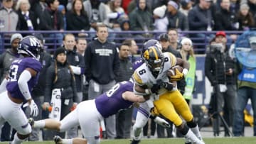 EVANSTON, ILLINOIS - OCTOBER 26: Ihmir Smith-Marsette #6 of the Iowa Hawkeyes runs the ball after a catch in the game against the Northwestern Wildcats during the third quarter at Ryan Field on October 26, 2019 in Evanston, Illinois. (Photo by Justin Casterline/Getty Images)