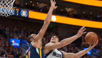 SALT LAKE CITY, UT - FEBRUARY 23: Rudy Gobert #27 of the Utah Jazz tries to block a shot by Dwight Powell #7 of the Dallas Mavericks during their game at the Vivint Smart Home Arena on February 23, 2019 in Salt Lake City, Utah. NOTE TO USER: User expressly acknowledges and agrees that, by downloading and or using this photograph, User is consenting to the terms and conditions of the Getty Images License Agreement.(Photo by Chris Gardner/Getty Images)