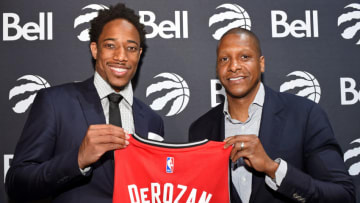 TORONTO, CANADA - JULY 14: DeMar DeRozan #10 and Masai Ujiri of the Toronto Raptors pose for a photo during a press conference after announcing his new deal on July 14, 2016 at the Real Sports Bar & Grill in Toronto, Ontario, Canada. NOTE TO USER: User expressly acknowledges and agrees that, by downloading and or using this Photograph, user is consenting to the terms and conditions of the Getty Images License Agreement. Mandatory Copyright Notice: Copyright 2016 NBAE (Photo by Ron Turenne/NBAE via Getty Images)