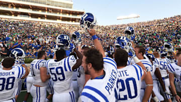 The Duke football celebrates a victory over Notre Dame in South Bend. (Photo by Stacy Revere/Getty Images)