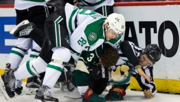Apr 18, 2016; Saint Paul, MN, USA; Dallas Stars forward Colton Sceviour (22) and Minnesota Wild forward Charlie Coyle (3) wrestle after the whistle in the second period in game three of the first round of the 2016 Stanley Cup Playoffs at Xcel Energy Center. Mandatory Credit: Brad Rempel-USA TODAY Sports