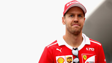 SUZUKA, JAPAN - OCTOBER 05: Sebastian Vettel of Germany and Ferrari walks during previews ahead of the Formula One Grand Prix of Japan at Suzuka Circuit on October 5, 2017 in Suzuka. (Photo by Mark Thompson/Getty Images)