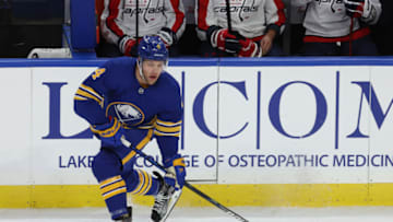 Jan 14, 2021; Buffalo, New York, USA; Buffalo Sabres left wing Taylor Hall (4) looks to make a pass during the second period against the Washington Capitals at KeyBank Center. Mandatory Credit: Timothy T. Ludwig-USA TODAY Sports