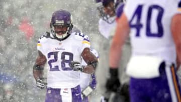Dec 8, 2013; Baltimore, MD, USA; Minnesota Vikings running back Adrian Peterson (28) runs onto the field during the game against the Baltimore Ravens at M&T Bank Stadium. Mandatory Credit: Evan Habeeb-USA TODAY Sports