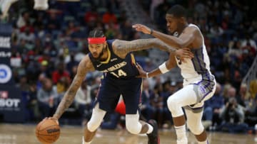 New Orleans Pelicans forward Brandon Ingram (14) is defended by Sacramento Kings guard De'Aaron Fox Credit: Chuck Cook-USA TODAY Sports