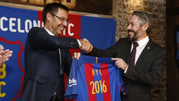 NEW YORK, NY - SEPTEMBER 07: Josep Maria Bartomeu, President of FC Barcelona, gifts a personalized team jersey to Jordi Getman-Eraso, President of Penya FC Barcelona New York City at Smithfield Hall on September 7, 2016 in New York City. (Photo by Jeff Zelevansky/Getty Images for FC Barcelona)