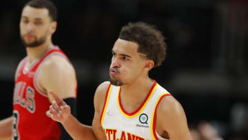 ATLANTA, GA - MARCH 03: Trae Young #11 of the Atlanta Hawks reacts after a score during the second half against the Chicago Bulls at State Farm Arena on March 3, 2022 in Atlanta, Georgia. NOTE TO USER: User expressly acknowledges and agrees that, by downloading and or using this photograph, User is consenting to the terms and conditions of the Getty Images License Agreement. (Photo by Todd Kirkland/Getty Images)