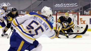 May 8, 2021; Pittsburgh, Pennsylvania, USA; Pittsburgh Penguins goaltender Maxime Lagace (31) defends a shot against Buffalo Sabres defenseman Rasmus Ristolainen (55) during the second period at PPG Paints Arena. Mandatory Credit: Charles LeClaire-USA TODAY Sports