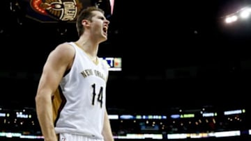 Jan 10, 2014; New Orleans, LA, USA; New Orleans Pelicans center Jason Smith (14) reacts after a basket against the Dallas Mavericks during the second quarter of a game at New Orleans Arena. Mandatory Credit: Derick E. Hingle-USA TODAY Sports