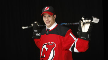 VANCOUVER, BRITISH COLUMBIA - JUNE 22: Nikita Okhotyuk poses after being selected 61st overall by the New Jersey Devils during the 2019 NHL Draft at Rogers Arena on June 22, 2019 in Vancouver, Canada. (Photo by Kevin Light/Getty Images)