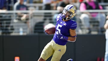 SEATTLE, WASHINGTON - AUGUST 31: Andre Baccellia #5 of the Washington Huskies scores on a bomb during the first game of the season against the Eastern Washington Eagles at Husky Stadium on August 31, 2019 in Seattle, Washington. (Photo by Alika Jenner/Getty Images)