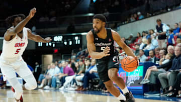 Cincinnati Bearcats guard David DeJulius drives during game against SMU Mustangs at Moody Coliseum. USA Today.